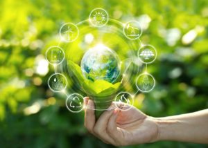 Human hand taking care of sustainable earth.